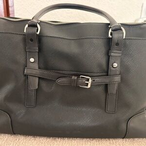 Tumi Black Tote Bag with Structured Design